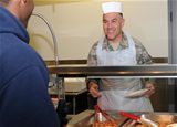 NASIC Command Chief serves meal