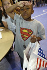 photo of boy saluting